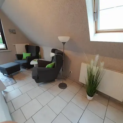 Ein Sitzbereich in der Unterkunft Ferienwohnung Greschke