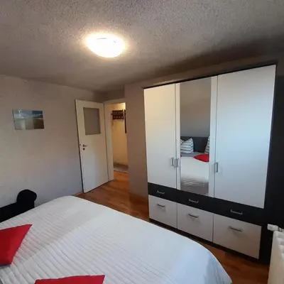 Ein Bett oder Betten in einem Zimmer der Unterkunft Ferienwohnung Greschke