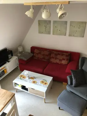 Ein Sitzbereich in der Unterkunft FeWo Sonnenblume Achtern Diek