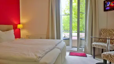 Ein Bett oder Betten in einem Zimmer der Unterkunft Ostsee Ferienappartements Dierhagen-Strand klein & fein