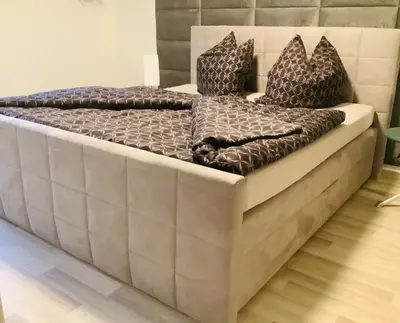 Ein Bett oder Betten in einem Zimmer der Unterkunft Haus Rose