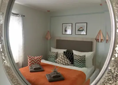 Ein Bett oder Betten in einem Zimmer der Unterkunft Wohlfühl-Apartments in Zingst