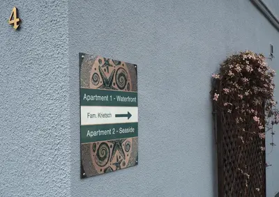 Ein Zertifikat, Auszeichnung, Logo oder anderes Dokument, das in der Unterkunft Wohlfühl-Apartments in Zingst ausgestellt ist