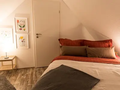 Ein Bett oder Betten in einem Zimmer der Unterkunft Borner Schlafwandler