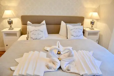 Ein Bett oder Betten in einem Zimmer der Unterkunft Villa Strandblick