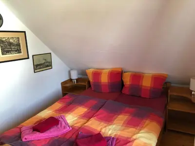 Ein Bett oder Betten in einem Zimmer der Unterkunft Ferienhaus Becker