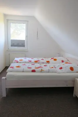 Ein Bett oder Betten in einem Zimmer der Unterkunft Haus Selma