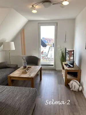 Ein Sitzbereich in der Unterkunft Haus Selma