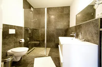 Ein Badezimmer in der Unterkunft Ferienwohnungen Auszeit und Freizeit