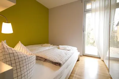 Ein Bett oder Betten in einem Zimmer der Unterkunft Ferienwohnungen Auszeit und Freizeit