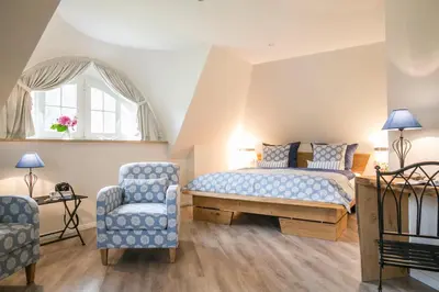 Ein Bett oder Betten in einem Zimmer der Unterkunft Ferienhaus Haubenlerche 16