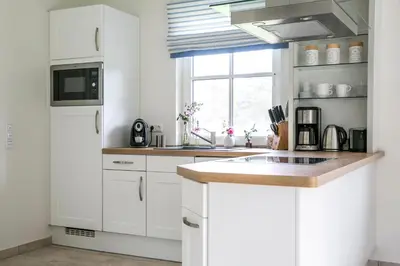 Küche/Küchenzeile in der Unterkunft Ferienhaus Haubenlerche 16