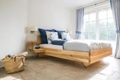 Ein Bett oder Betten in einem Zimmer der Unterkunft Ferienhaus Haubenlerche 16