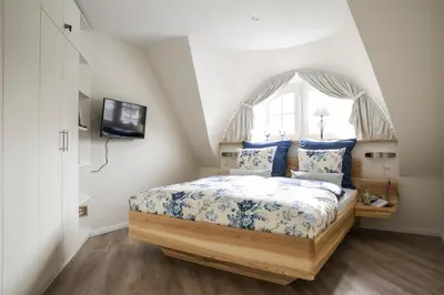 Ein Bett oder Betten in einem Zimmer der Unterkunft Ferienhaus Haubenlerche 16