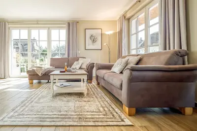 Ein Sitzbereich in der Unterkunft Ferienhaus Haubenlerche 20