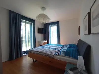 Ein Bett oder Betten in einem Zimmer der Unterkunft Refugium Prerow