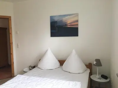 Ein Bett oder Betten in einem Zimmer der Unterkunft Haus Hugo Zingst