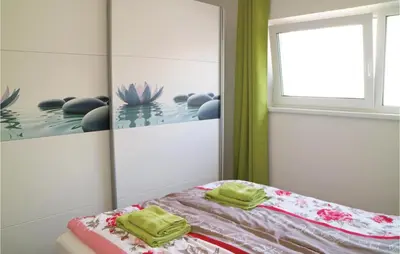 Ein Bett oder Betten in einem Zimmer der Unterkunft 2 Bedroom Nice Apartment In Barth