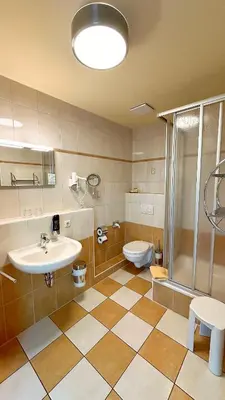 Ein Badezimmer in der Unterkunft Hotel Strandburg Prerow