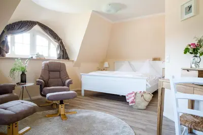 Ein Bett oder Betten in einem Zimmer der Unterkunft Ferienhaus Haubenlerche 25
