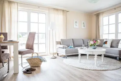 Ein Sitzbereich in der Unterkunft Ferienhaus Haubenlerche 25