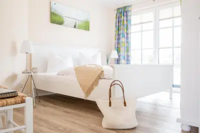 Ein Bett oder Betten in einem Zimmer der Unterkunft Ferienhaus Haubenlerche 25