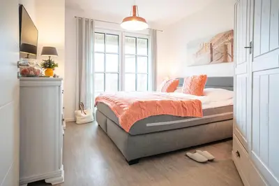 Ein Bett oder Betten in einem Zimmer der Unterkunft Ferienhaus Haubenlerche 32