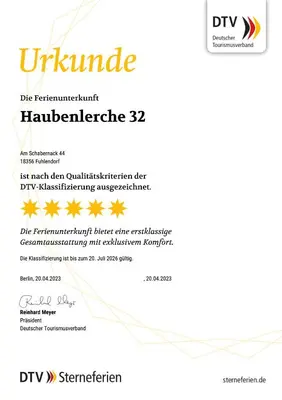 Ein Zertifikat, Auszeichnung, Logo oder anderes Dokument, das in der Unterkunft Ferienhaus Haubenlerche 32 ausgestellt ist
