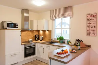 Küche/Küchenzeile in der Unterkunft Ferienhaus Haubenlerche 52
