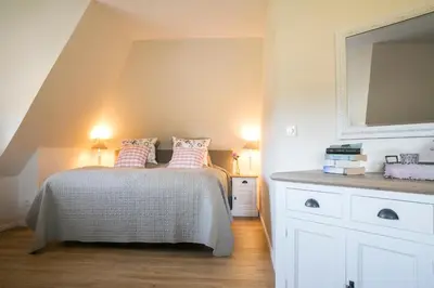 Ein Bett oder Betten in einem Zimmer der Unterkunft Ferienhaus Haubenlerche 59