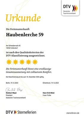 Ein Zertifikat, Auszeichnung, Logo oder anderes Dokument, das in der Unterkunft Ferienhaus Haubenlerche 59 ausgestellt ist