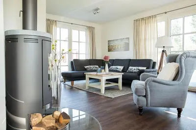 Ein Sitzbereich in der Unterkunft Ferienhaus Haubenlerche 62