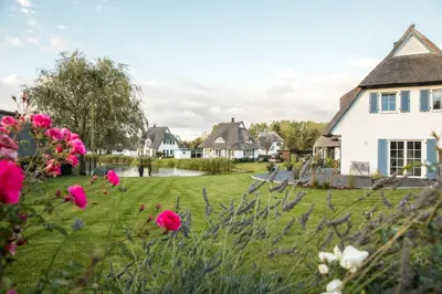 Ein Garten an der Unterkunft Ferienhaus Schilfrohrsaenger 18