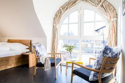 Ein Sitzbereich in der Unterkunft Ferienhaus Schilfrohrsaenger 26