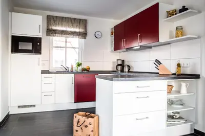 Küche/Küchenzeile in der Unterkunft Ferienhaus Schilfrohrsaenger 26