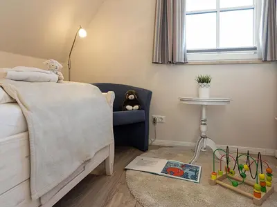 Ein Sitzbereich in der Unterkunft Ferienhaus Schilfrohrsaenger 28
