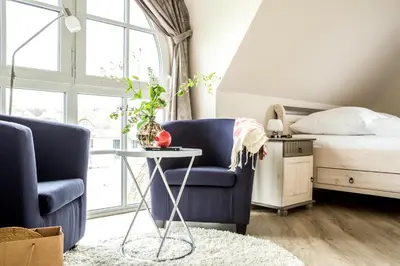 Ein Sitzbereich in der Unterkunft Ferienhaus Schilfrohrsaenger 30