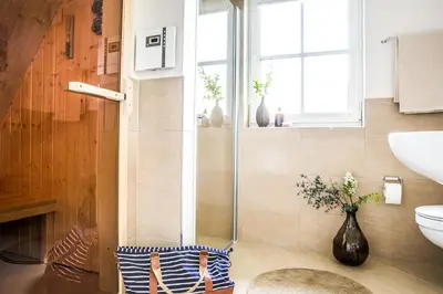 Ein Badezimmer in der Unterkunft Ferienhaus Schilfrohrsaenger 30