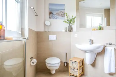Ein Badezimmer in der Unterkunft Ferienhaus Schilfrohrsaenger 30
