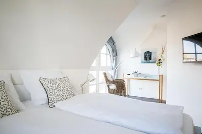 Ein Bett oder Betten in einem Zimmer der Unterkunft Ferienhaus Schilfrohrsaenger 45