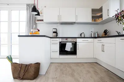 Küche/Küchenzeile in der Unterkunft Ferienhaus Schilfrohrsaenger 45