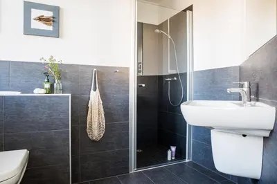 Ein Badezimmer in der Unterkunft Ferienhaus Schilfrohrsaenger 45