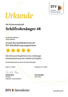 Ein Zertifikat, Auszeichnung, Logo oder anderes Dokument, das in der Unterkunft Ferienhaus Schilfrohrsaenger 48 ausgestellt ist