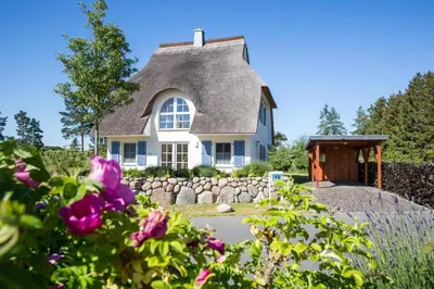 Ein Garten an der Unterkunft Ferienhaus Schilfrohrsaenger 48