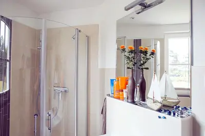 Ein Badezimmer in der Unterkunft Ferienhaus Schilfrohrsaenger 61