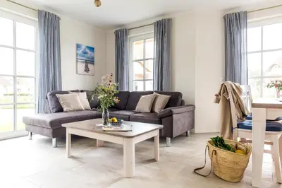Ein Sitzbereich in der Unterkunft Ferienhaus Seeschwalbe 35