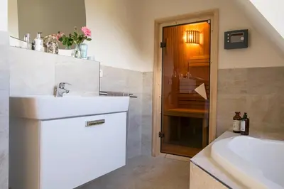 Ein Badezimmer in der Unterkunft Ferienhaus Seeschwalbe 55