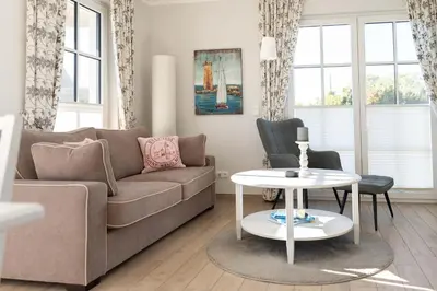 Ein Sitzbereich in der Unterkunft Ferienhaus Seeschwalbe 55