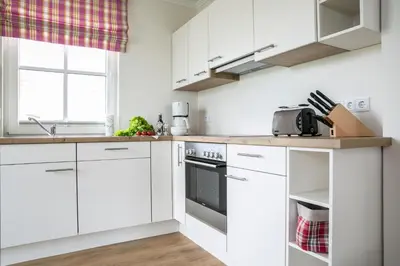 Küche/Küchenzeile in der Unterkunft Ferienhaus Seeschwalbe 60