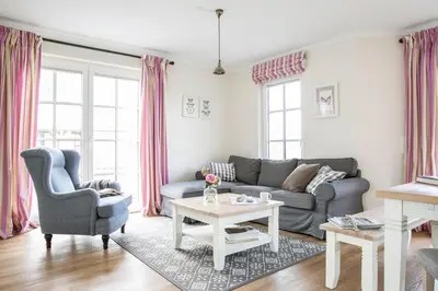 Ein Sitzbereich in der Unterkunft Ferienhaus Seeschwalbe 60
